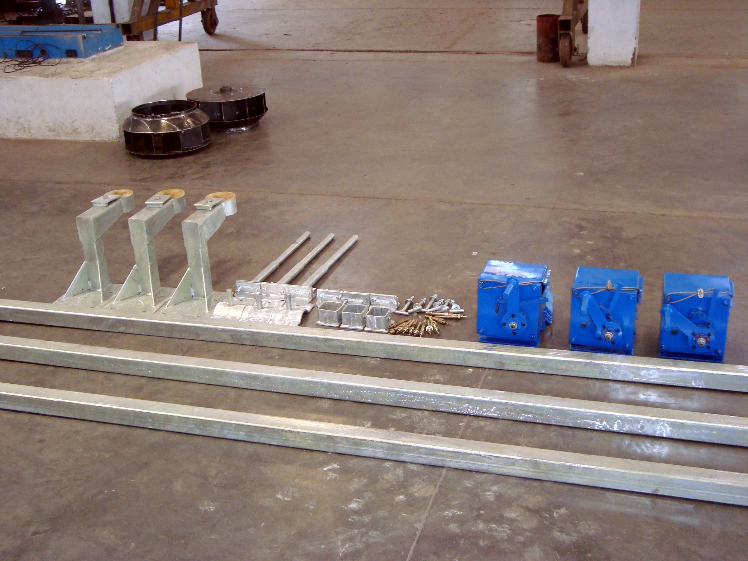 Guide-rail lifting system components for submersible mixers — rails, brackets and gearboxes, built to customer drawing